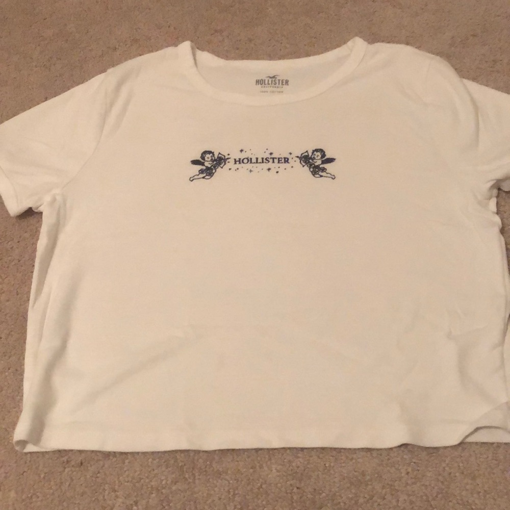 Crop white shirt with Angels embroidered on it